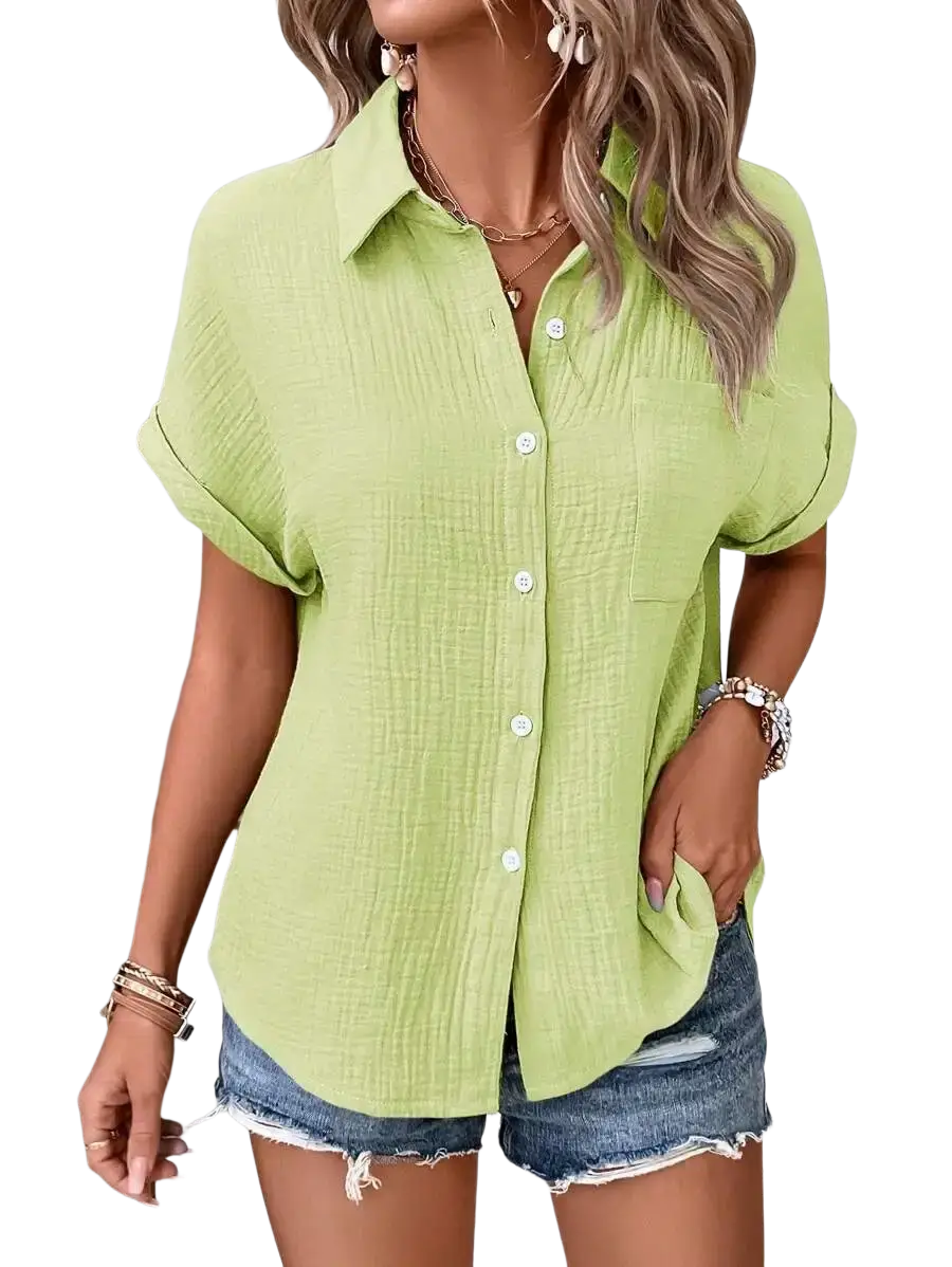 Women cotton short sleeve button up shirt in light green with subtle textured fabric and rolled cuffs