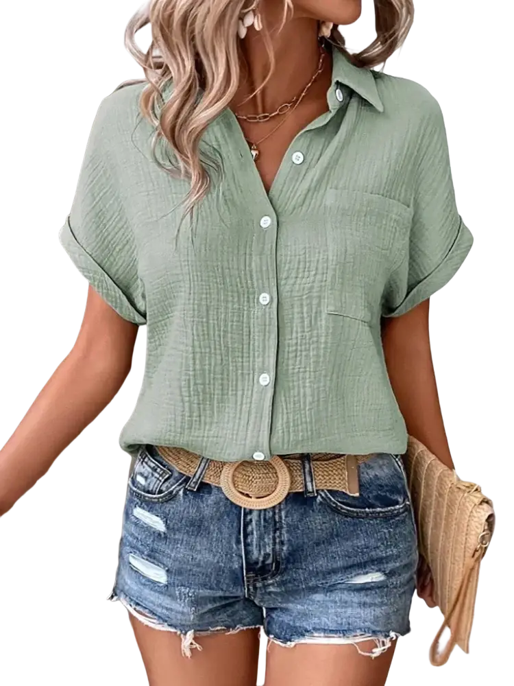 Women cotton short sleeve button up shirt in soft sage green with a subtle textured weave and rolled cuffs