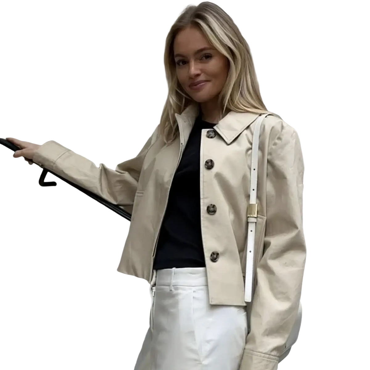 Beige cropped trench coat for women with dark buttons and a structured collar perfect as a short windbreaker