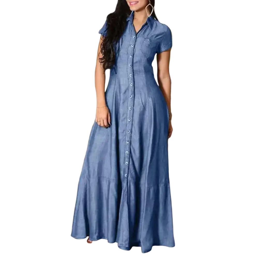 A woman wearing a blue denim maxi dress with short sleeves and button-down front featuring a ruffle hem