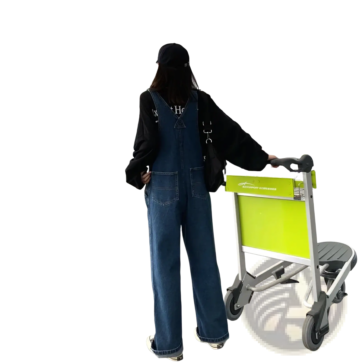 Women denim overalls wide leg suspender pants in blue denim paired with a black long-sleeved shirt and cap