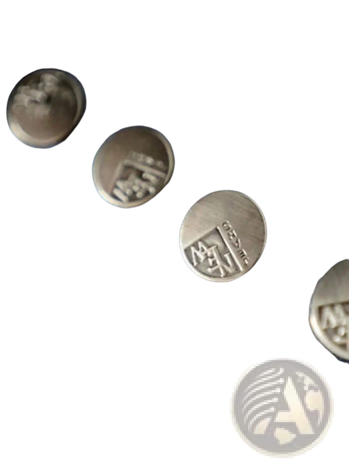 Silver-toned metal buttons embossed with men branding on blue denim fabric of women denim vest jacket casual sleeveless outerwear