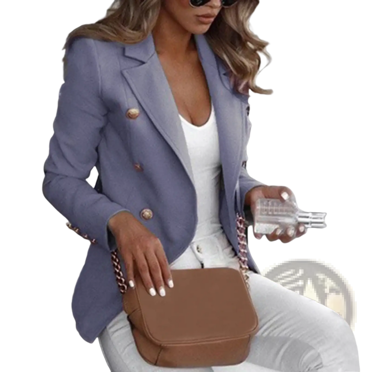 Brown leather crossbody bag with chain strap paired with women double breasted tan blazer front view