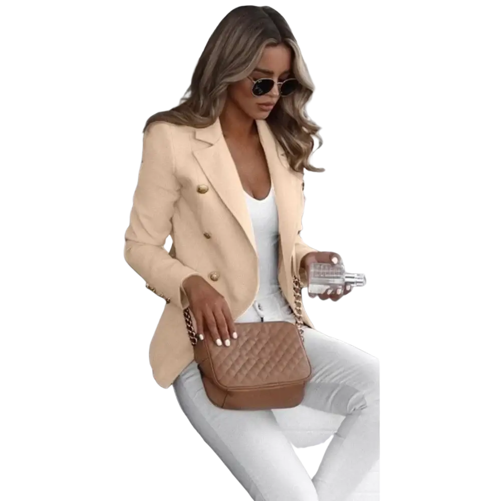 Tan quilted leather crossbody bag with gold-tone chain strap paired with women double breasted tan blazer