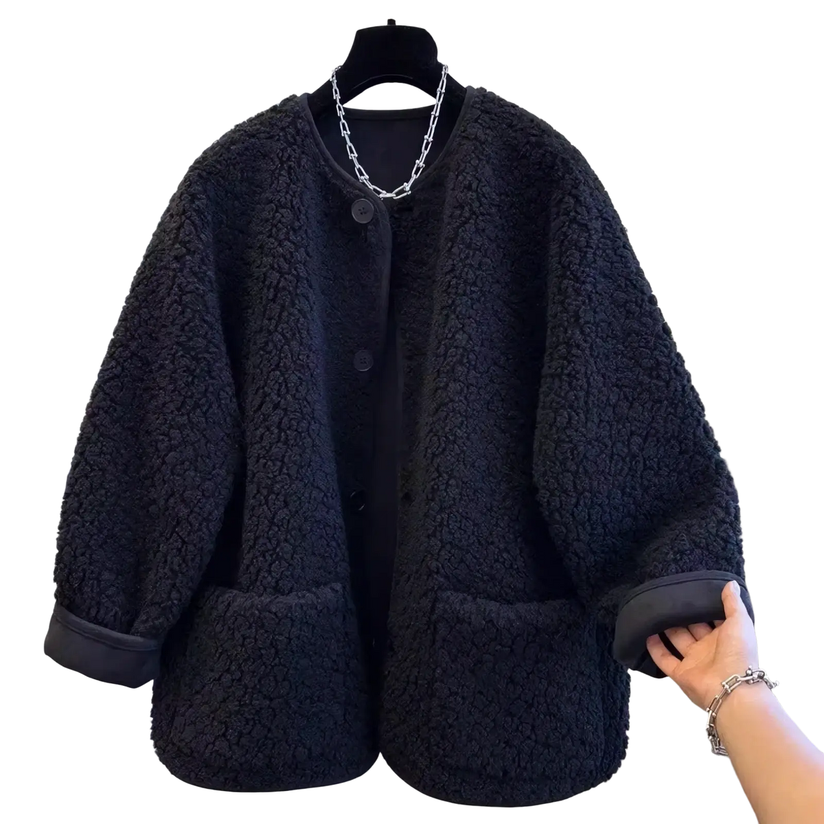 Women faux shearling cropped coat in black with fluffy texture, round neckline, and button closure for winter wear