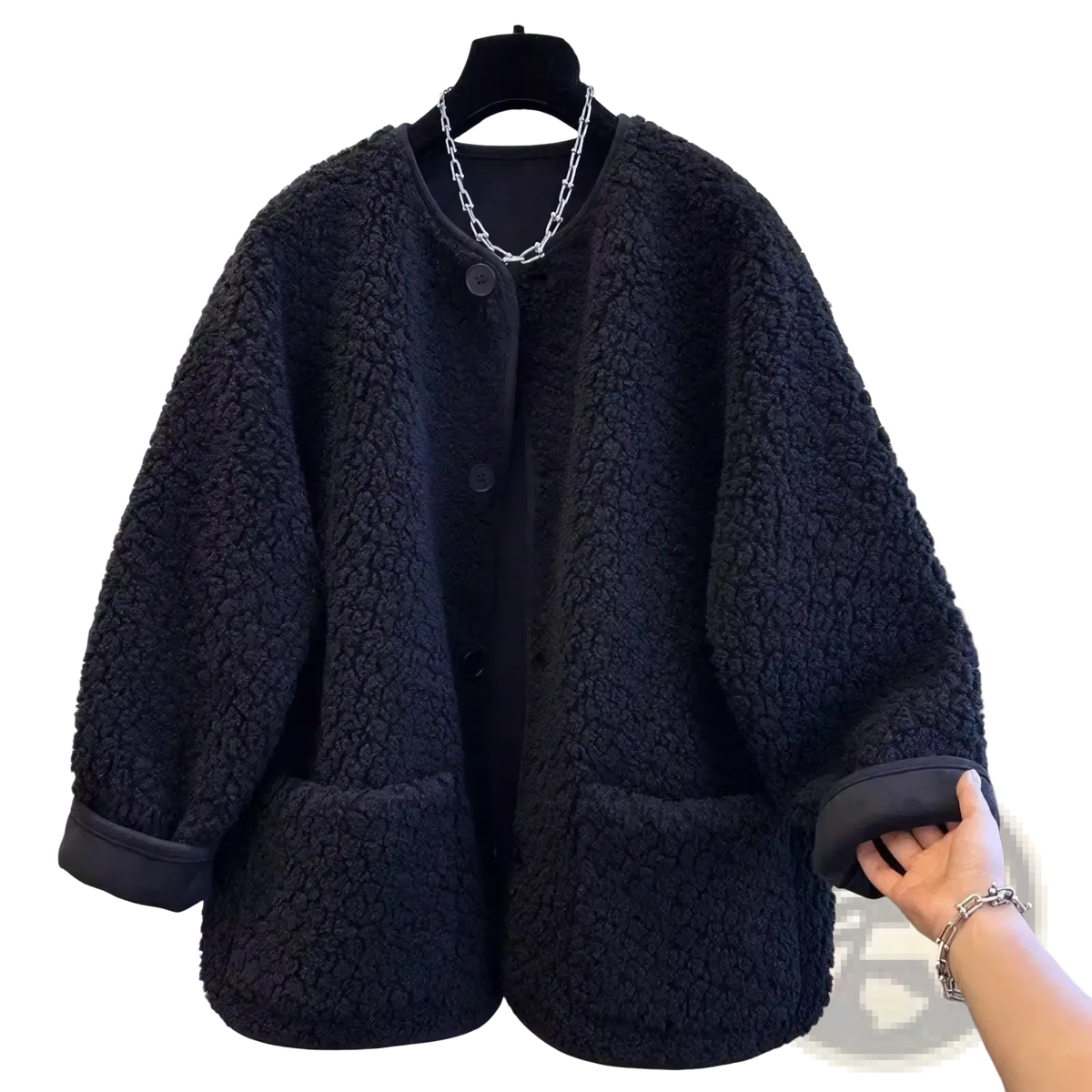 Women faux shearling cropped coat in black with fluffy texture, round neckline, and button closure for winter wear