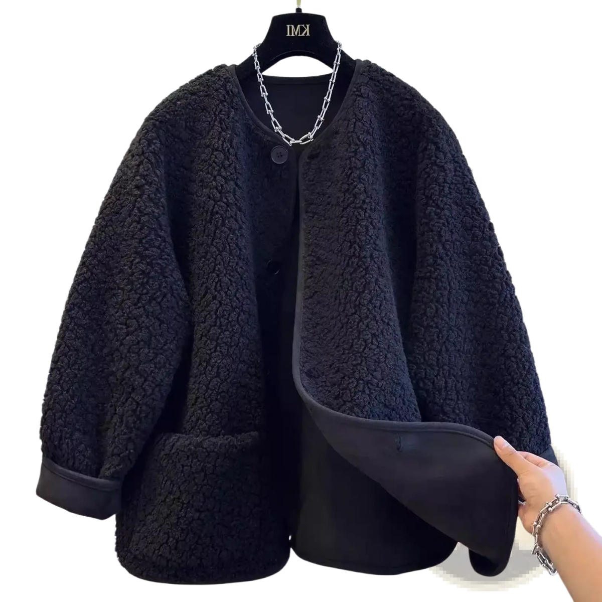 Women faux shearling cropped coat in black with soft plush texture and sleek black inner lining for winter wear