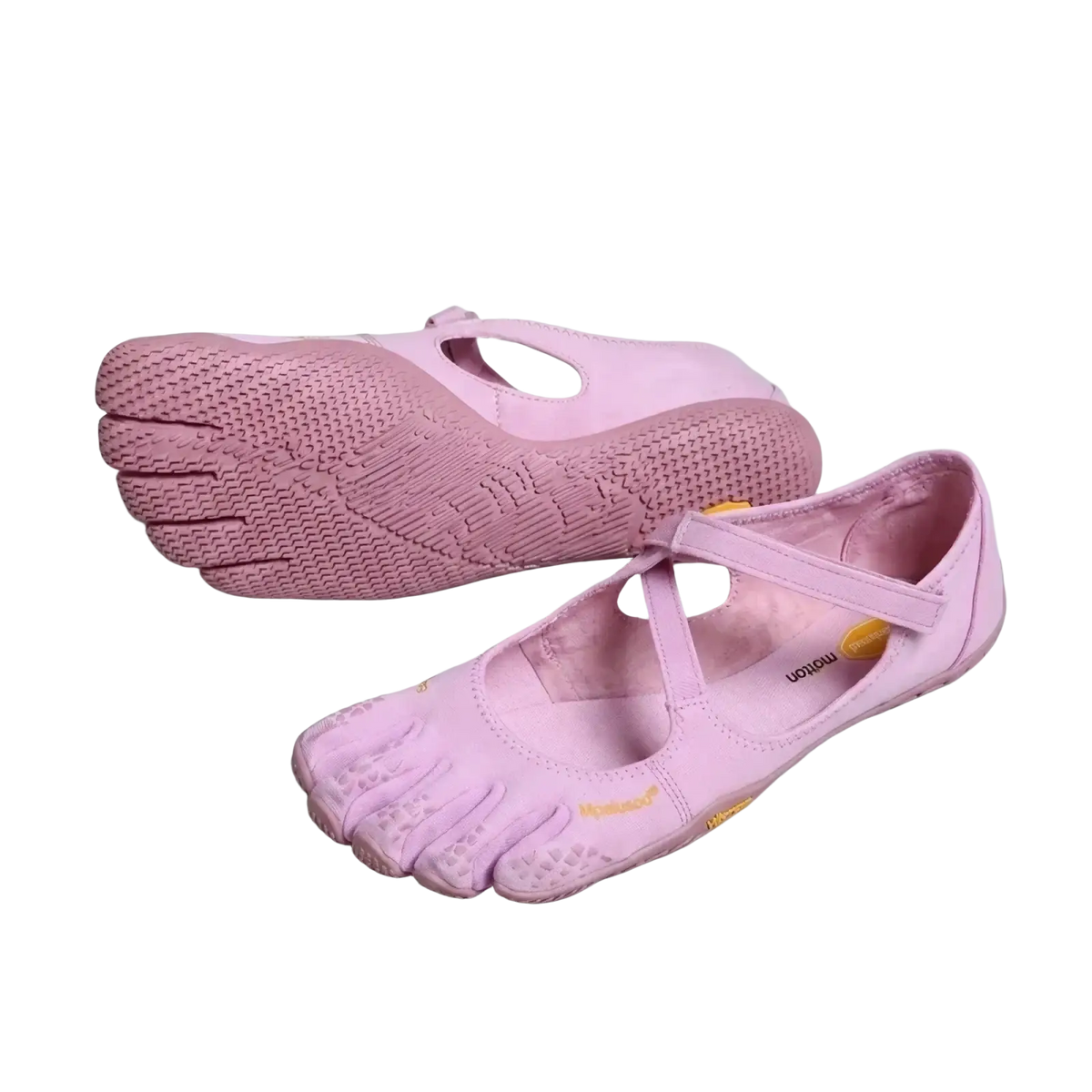 Women five toe minimalist barefoot shoes in pink with yellow branding and textured rubber sole for barefoot running