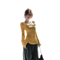 Yellow long-sleeved floral slim t-shirt with ruched detailing and square neckline featuring black printed text