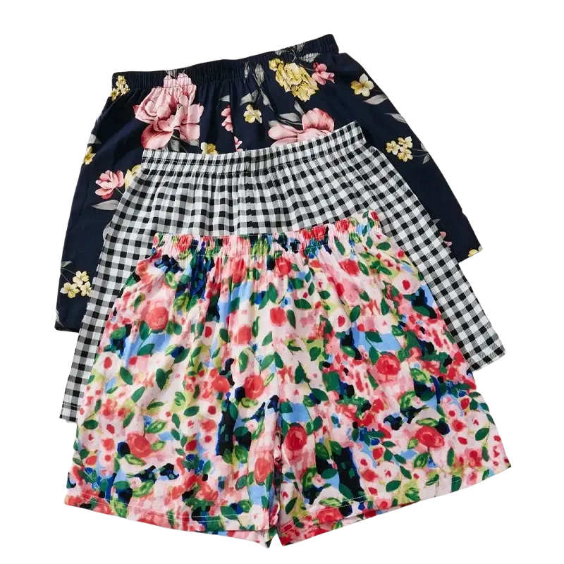 Three pairs of women floral viscose lounge shorts with gingham patterns and loose elastic waistbands for comfort