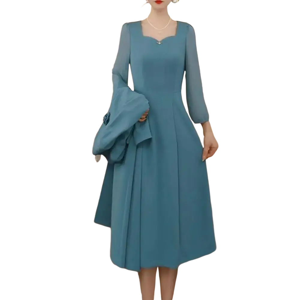 A woman wears a teal long-sleeved midi dress with square neckline and pleated skirt in a women formal blazer dress set