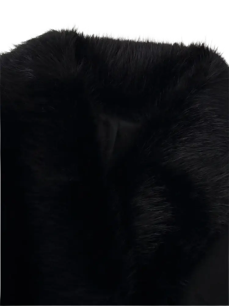 Black faux fur collar with dense plush texture on a women fur collar woolen coat for elegant warmth and style