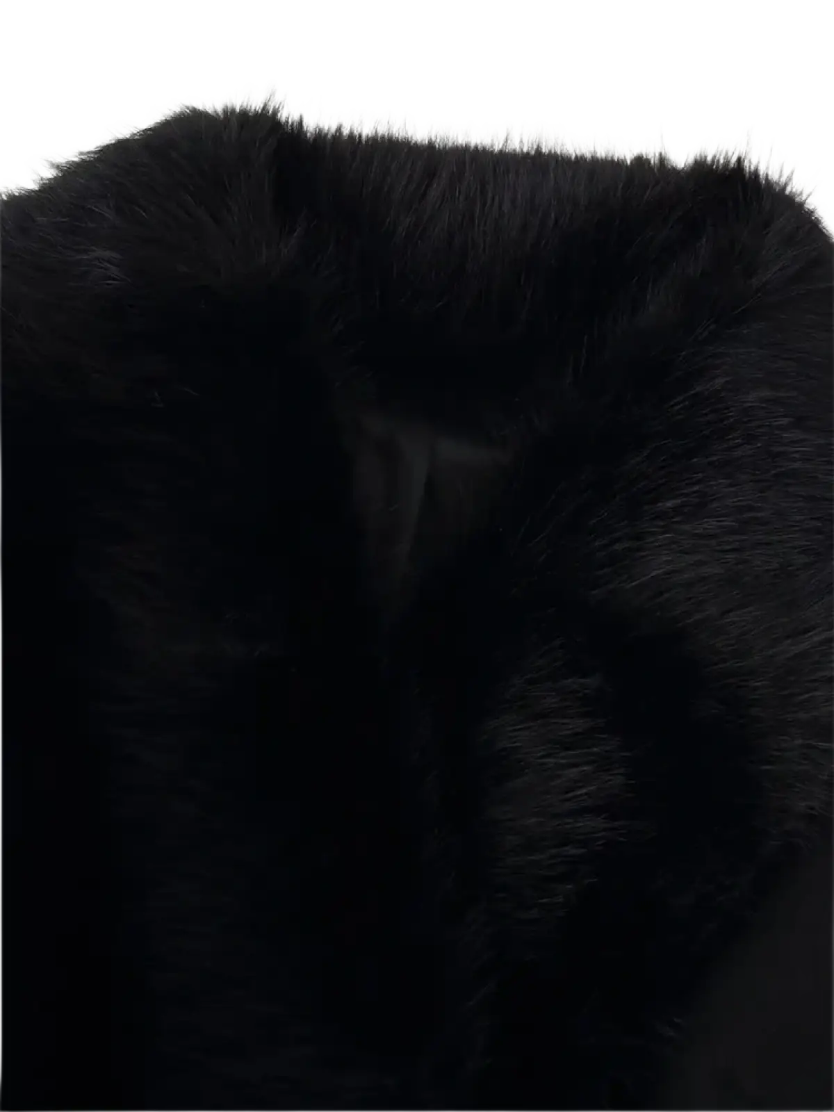 Black faux fur collar with dense plush texture on a women fur collar woolen coat for elegant warmth and style