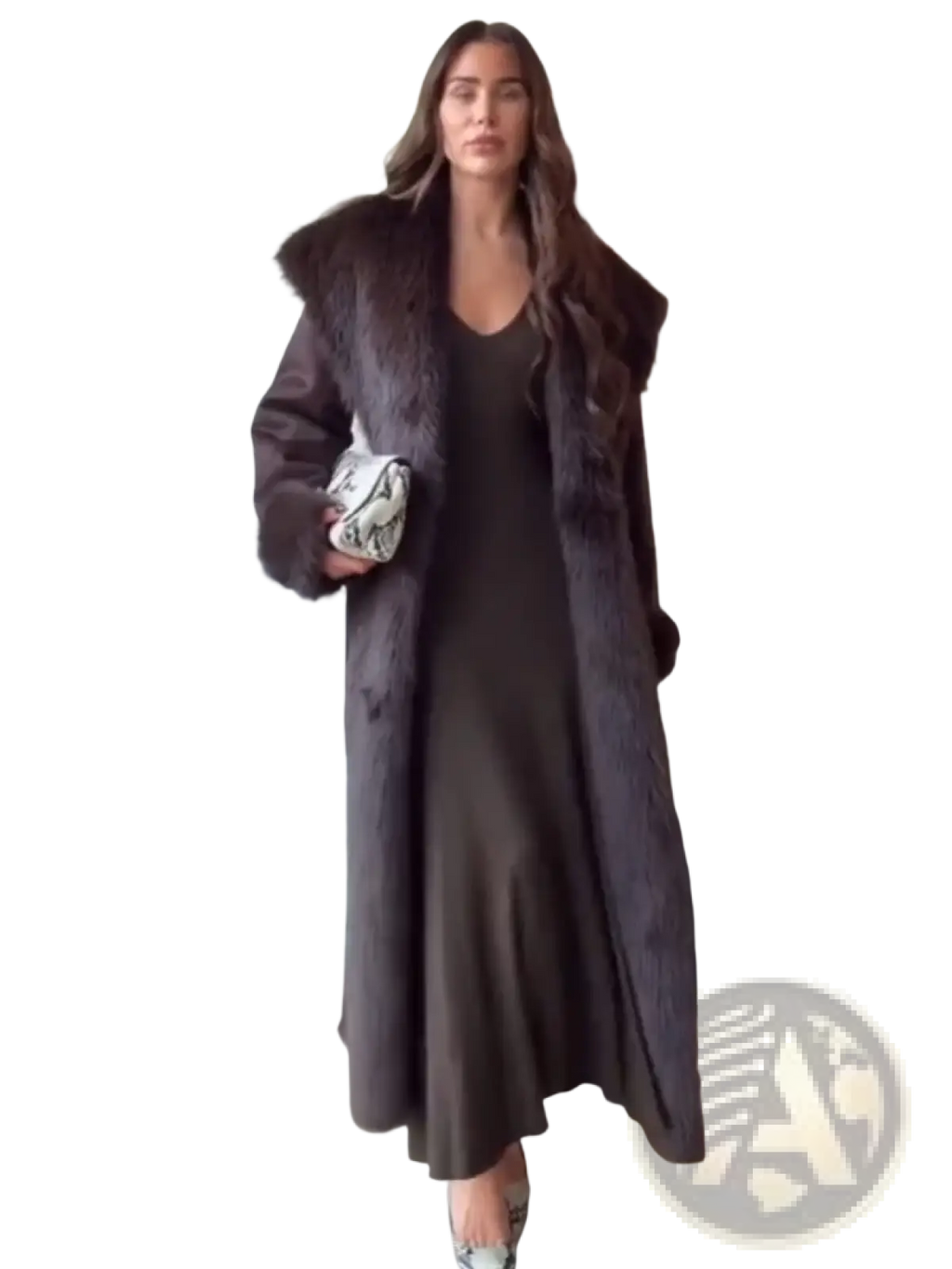 A dark gray satin slip dress with v-neckline and flowing silhouette paired with a women fur collar woolen coat
