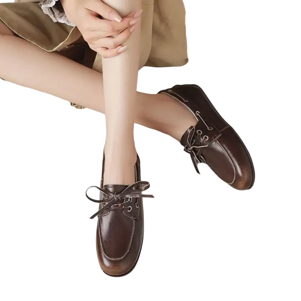 Women genuine leather boat shoes in brown with lace-up design and polished leather finish