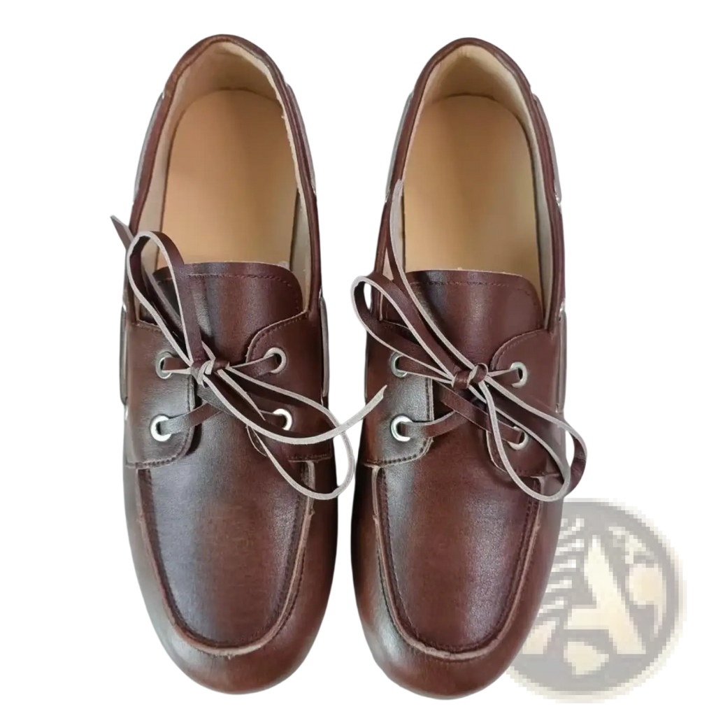Women genuine leather boat shoes in brown with light-colored laces and silver eyelets showcasing classic craftsmanship