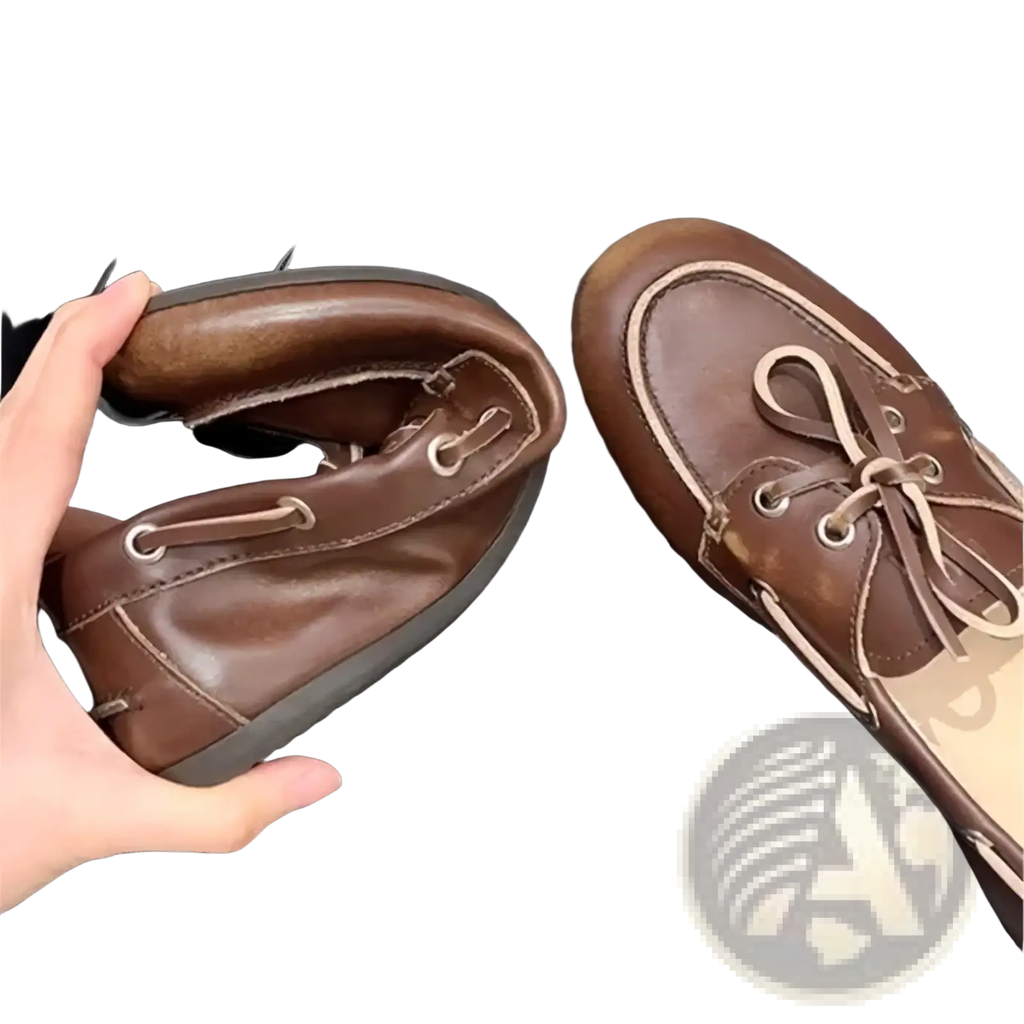 Women genuine leather lace up loafers in brown with light-colored laces and stitching designed as boat shoes