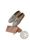 A pair of women genuine leather white lace up loafers with a classic minimalist design