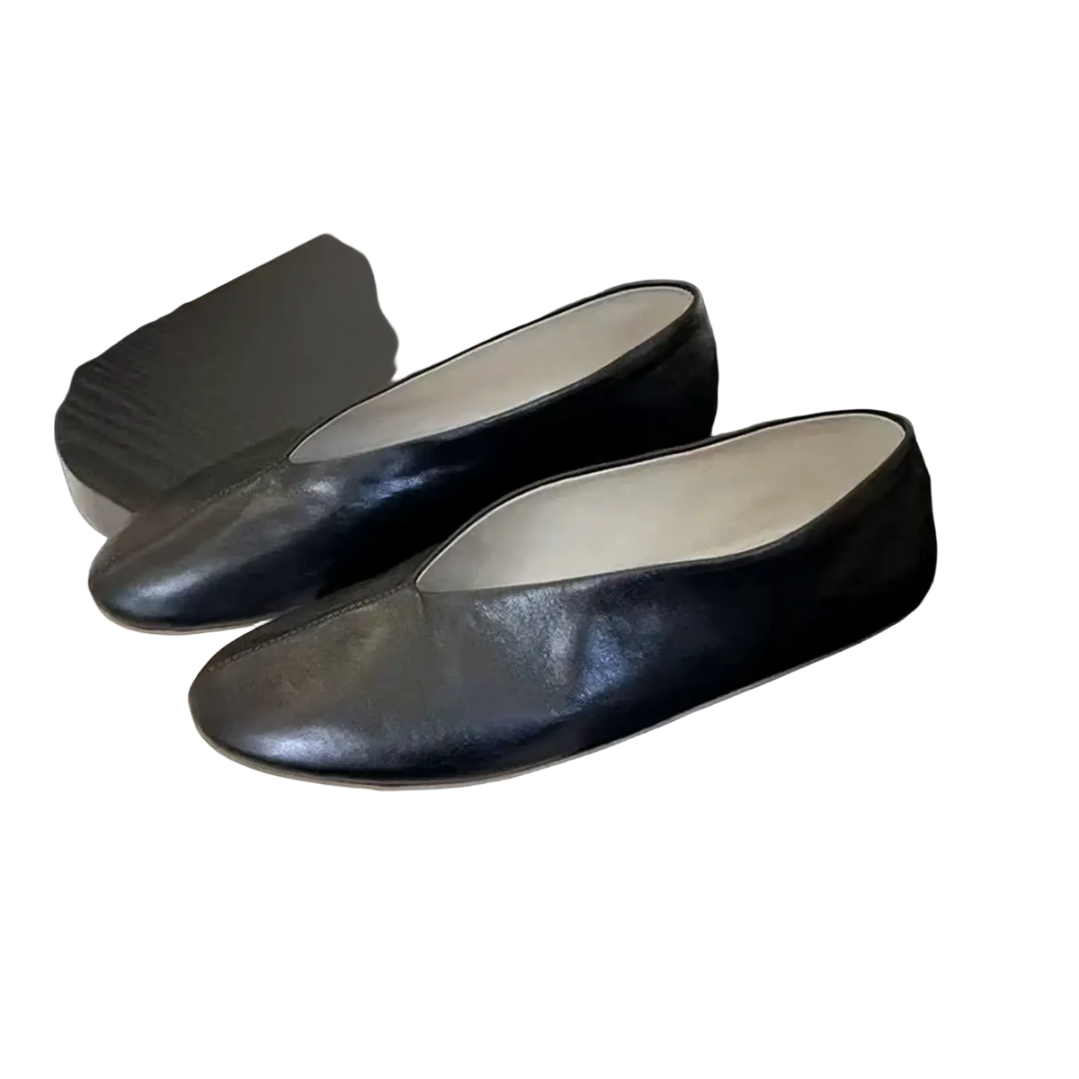 Black leather ballet flats with a smooth glossy finish featuring a minimalist design for women genuine leather loafers flat shoes