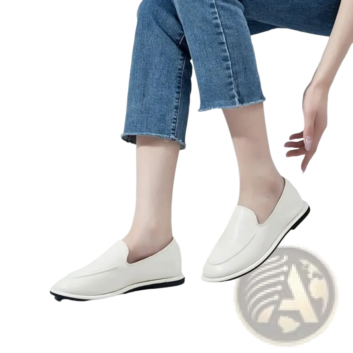Women genuine leather slip-on flats in white with sleek minimalist design and black rubber soles for casual wear