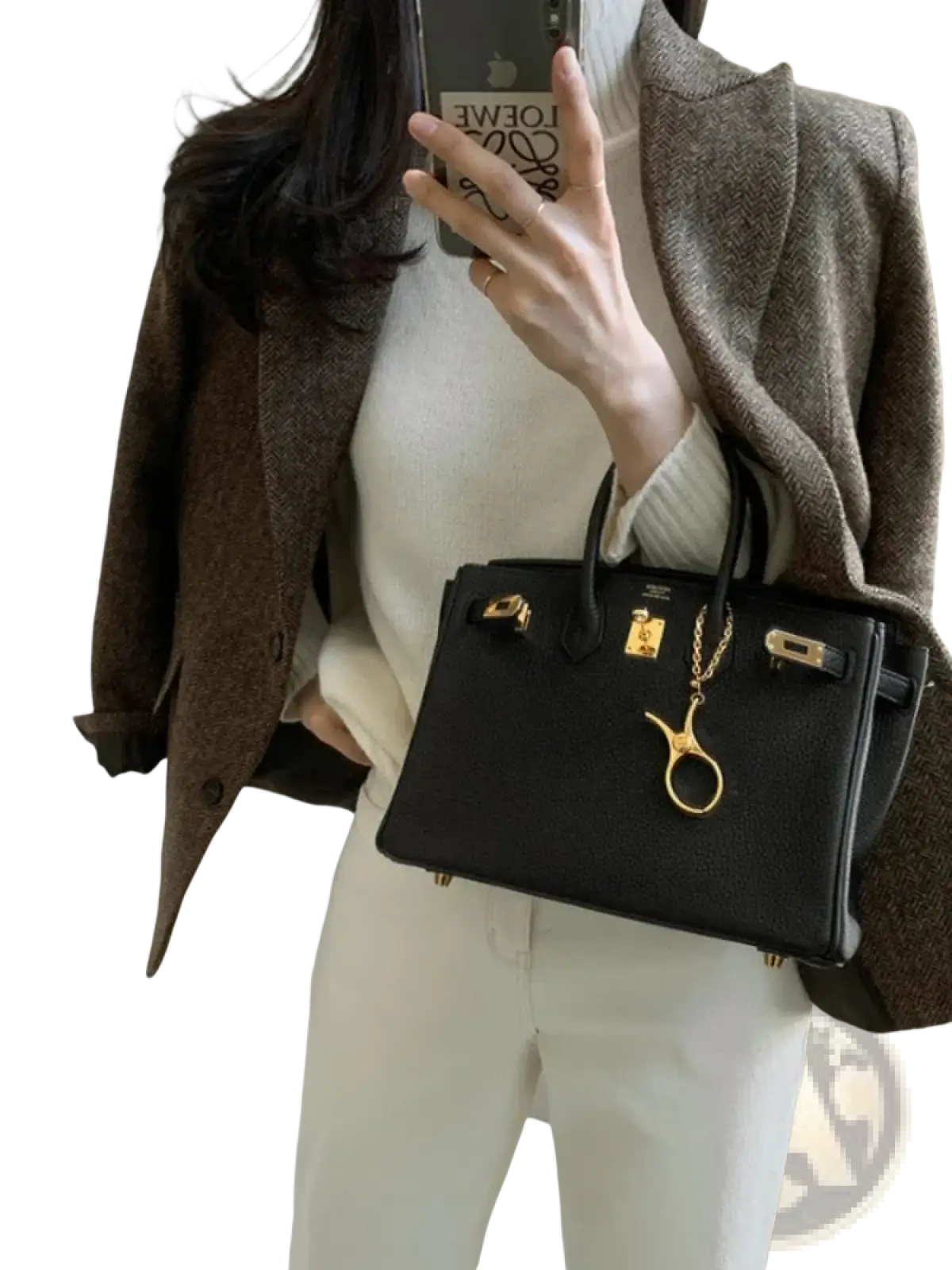 Black leather hermès birkin handbag with gold-tone hardware and scissors charm alongside women gray herringbone wool blazer