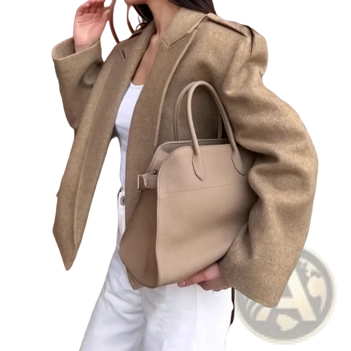 Beige textured leather handbag with structured shape and top handles paired with women gray tweed shoulder pad blazer jacket