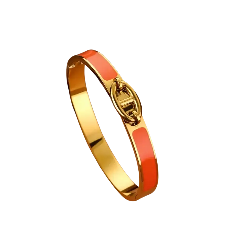 Women h bangle gold enamel minimalist bracelet featuring a gold-tone bangle with coral enamel panels and interlocking clasp