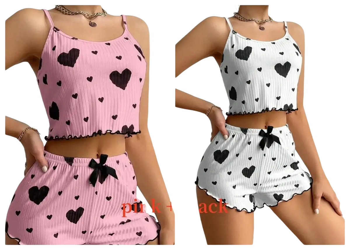 Women heart print pajama set featuring a pink and black heart patterned ribbed crop top and shorts with 8cm length bottoms