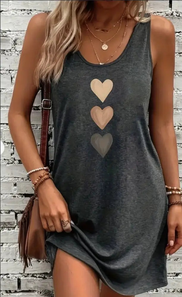 A dark gray sleeveless summer tank dress for women with three layered heart cutouts down the front