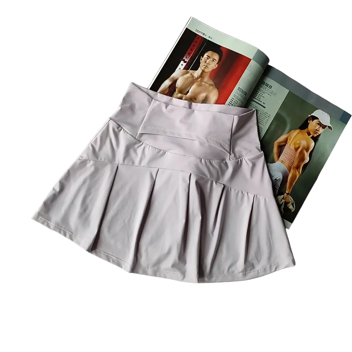 A light gray high waist pleated tennis skirt with layered fabric designed for quick dry athletic use