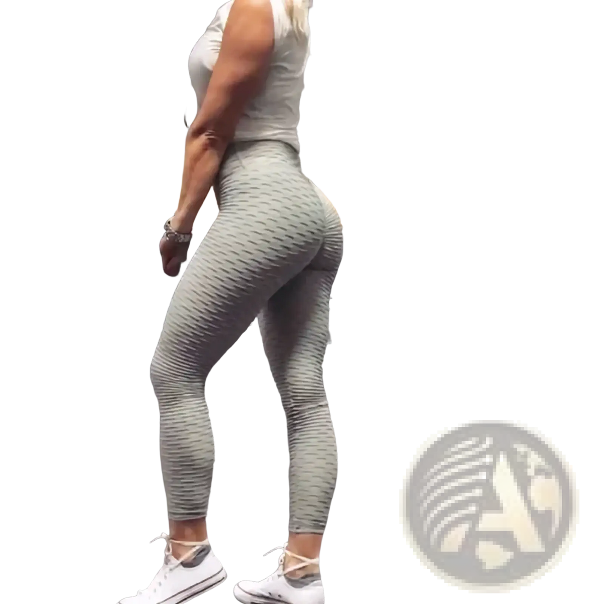 Women high waisted compression yoga leggings in light gray with ribbed textured fabric and form fitting design