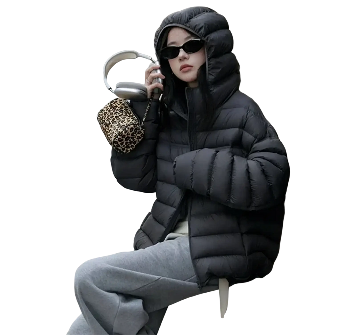 Black quilted puffer jacket with hood for women designed as a warm winter coat for cold weather use