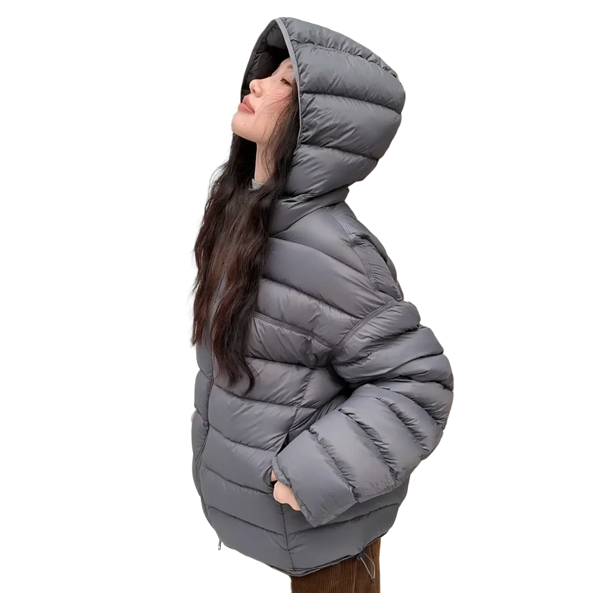 A gray quilted hooded puffer jacket for women designed as a warm winter coat