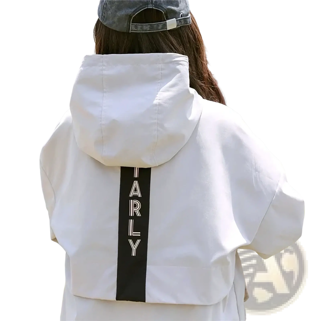 Back view of a white women hooded trench coat with a black vertical stripe and white lettering casual loose outerwear