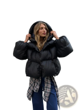 Black women hooded winter puffer jacket with quilted design and insulated material for cold weather protection