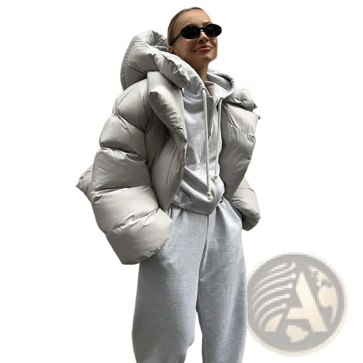 Women hooded winter puffer jacket in light gray down with quilted design and voluminous hood for cold weather