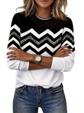 Women knit top in black and white chevron pattern with glittery zigzag accents featuring a slimming design and lightweight knit