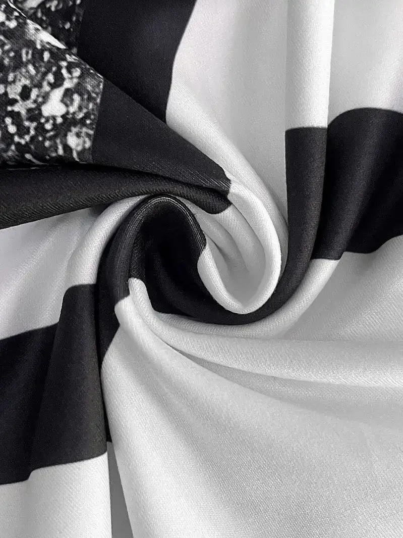 Woman knit top with black and white striped fabric and leopard-print accent panel featuring lightweight slimming design