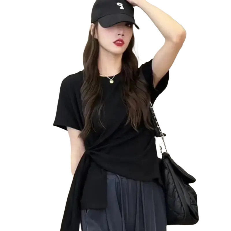 Black quilted leather shoulder bag with chain strap paired with women knotted casual summer t shirt
