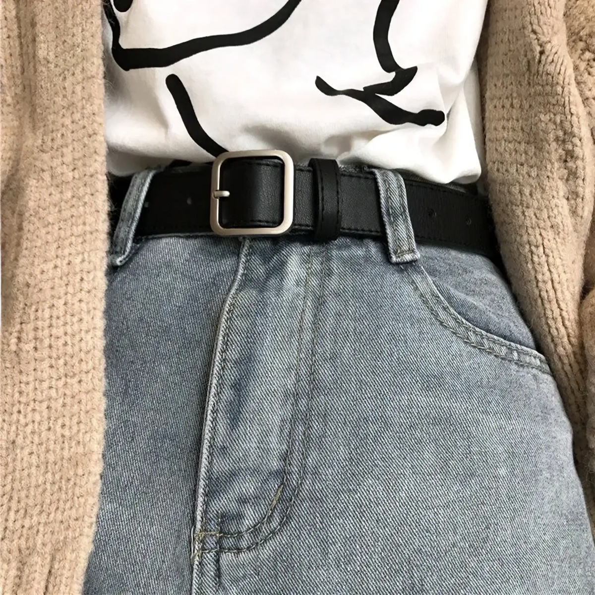Black leather women belt with a silver-toned rectangular buckle for casual fashion waist strap use