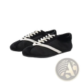 Women leather casual sneakers in black suede with white laces and a white zigzag stripe across the toe