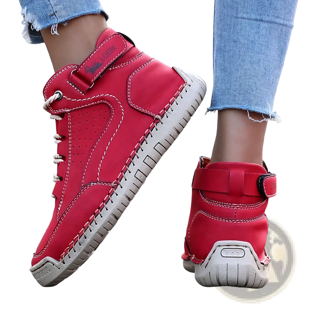 Women leather walking sneakers in red high tops with white laces and beige rubber sole featuring visible stitching