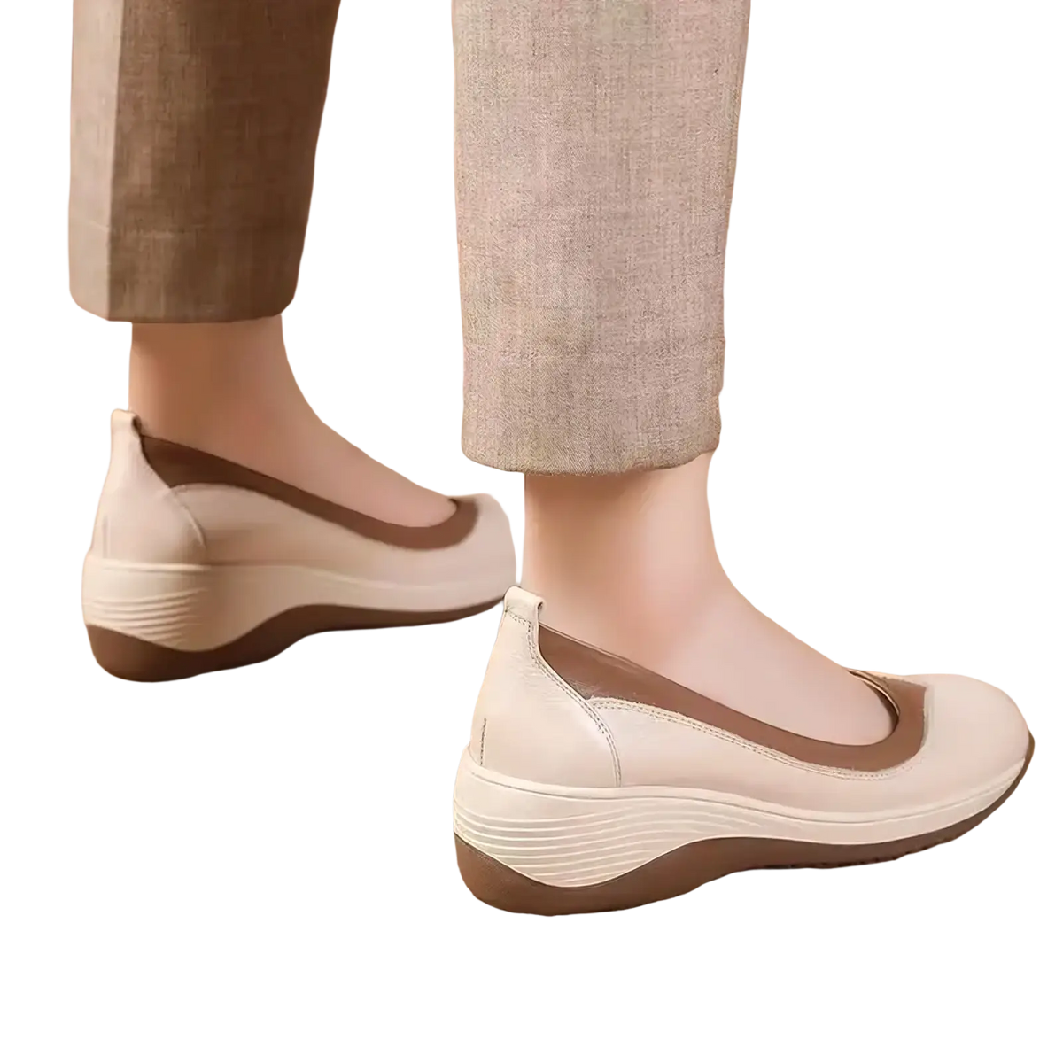 Cream-colored leather women wedge shoes with brown accent stripe and textured cushioned slip-on sole for casual wear