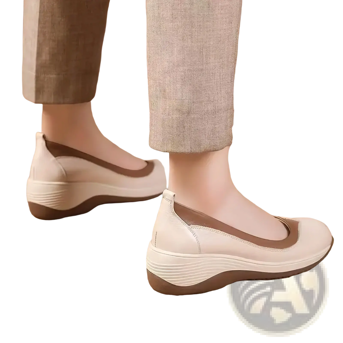 Cream-colored leather women wedge shoes with brown accent stripe and textured cushioned slip-on sole for casual wear
