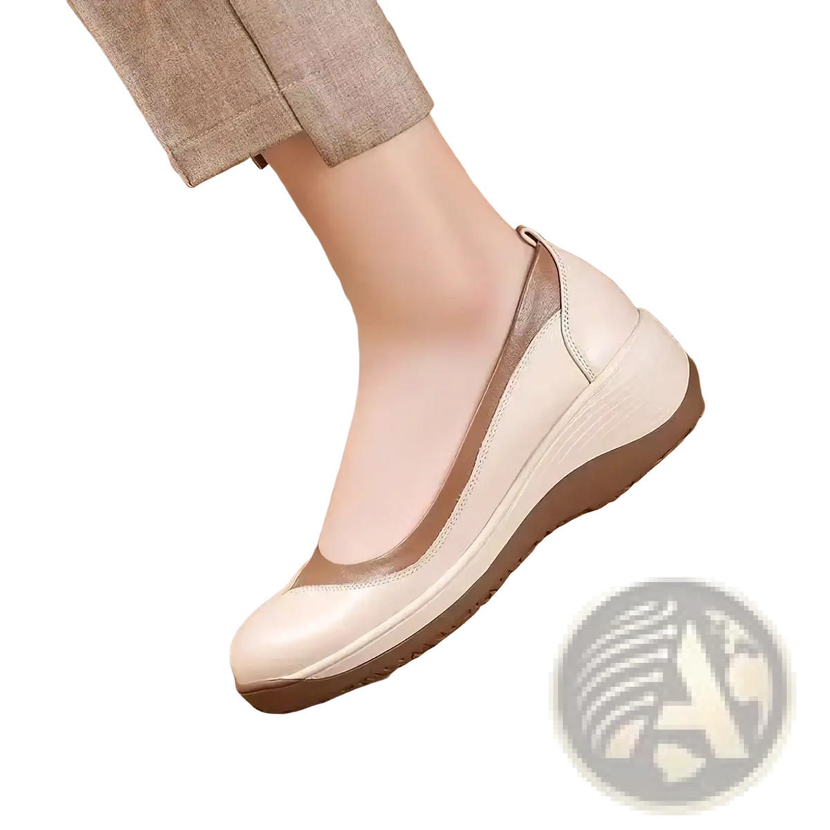 Cream-colored leather women casual slip on wedge shoe with tan accent panel and thick cushioned wedge sole