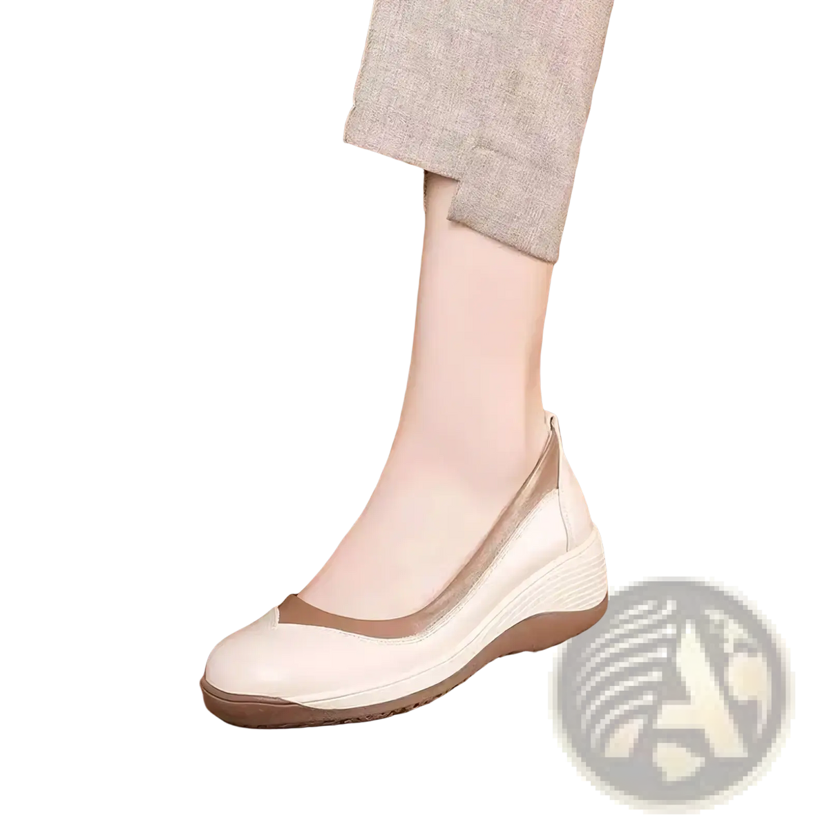 White leather women wedge shoe with tan accent panel and textured sole designed for casual slip on wear