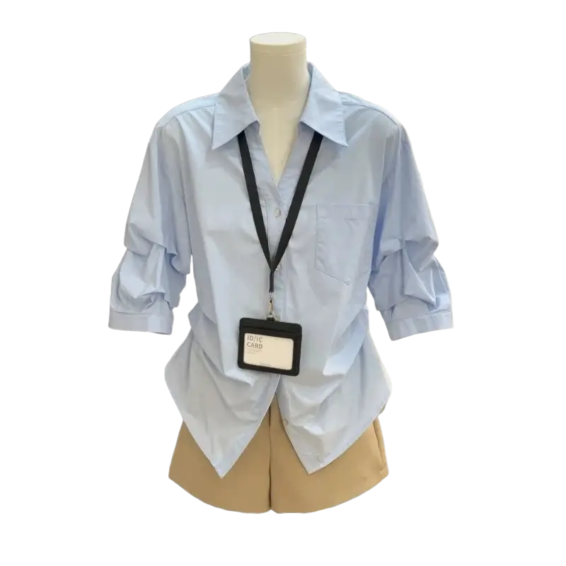 Women light blue long-sleeved spring summer casual button down shirt with rolled cuffs and chest pocket