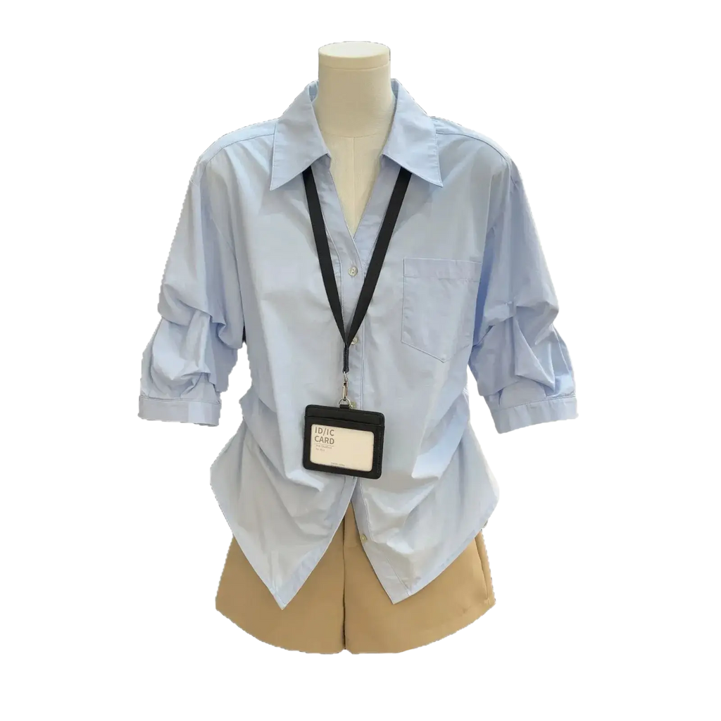 Women light blue spring summer casual button down shirt with rolled sleeves and front pocket in oversized fit