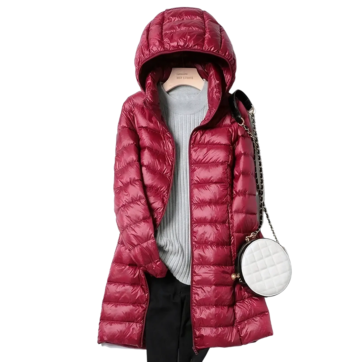 A shiny quilted maroon lightweight down parka hooded winter coat for women with a front zipper