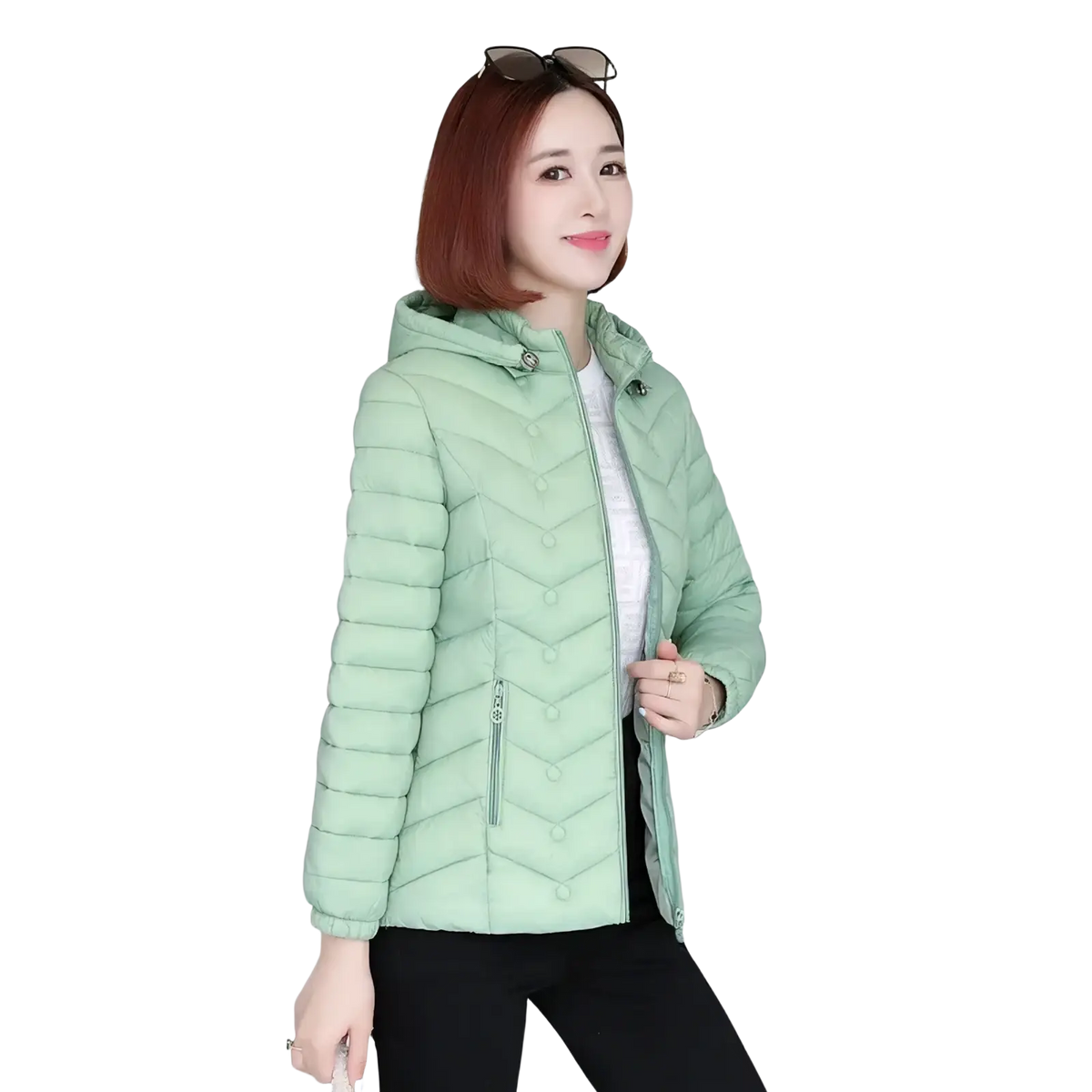 Women lightweight hooded puffer jacket in mint green with quilted chevron pattern and front zipper closure
